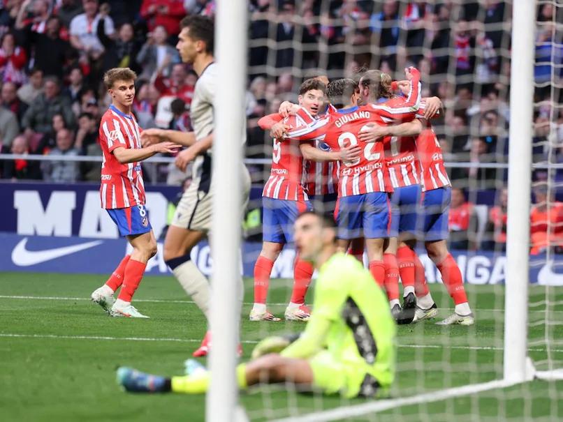 Atletico Madrid's Unyielding Performance Propels Them to the Top of La Liga with Victory Against Osasuna